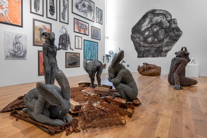 Art gallery with sculptures displayed
